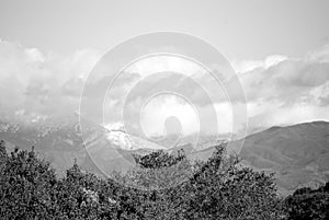 Snow fall on the hills b/w