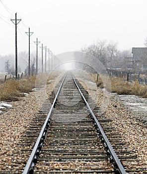 Snow Falling on a Colorado Railroad Track