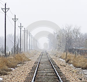 Snow Falling on a Colorado Railroad Track