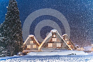 Snow falling on light Up Festival in winter at shirakawago Gifu Chubu Japan