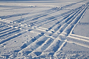 Snow fields covered with intricate patterns from the wind, a copy space, close-up.