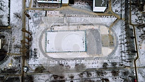 Snow football pitch. Football field top view in the winte