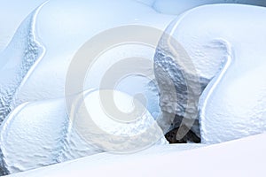 Snow forms around the river