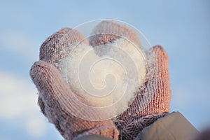 Snow, frosty love in mittens