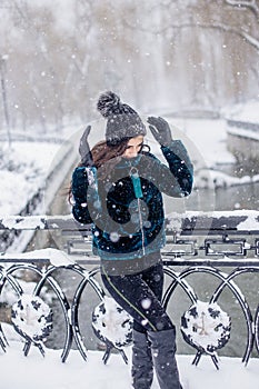 Snow girl portrait on park.