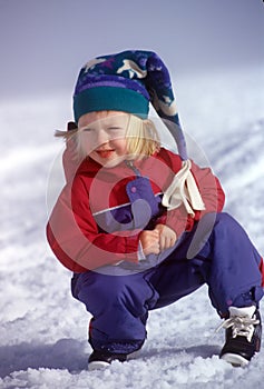 Snow Girl In Snowsuit And Cap