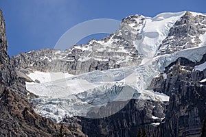 Snow on glacier shaped like giant face at Lake Moraine, Banff National Park, Canadian Rockies, Alberta, Canada