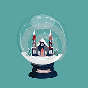 Snow globe / snow ball / christmas scene - navy church with red roof coverd in snow.