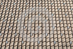 Snow guards or stoppers on house roof