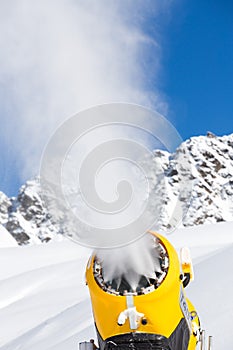 Snow gun in the mountains