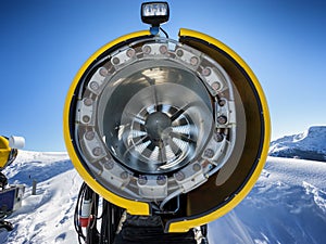 Snow gun on ski slope