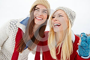 Snow, happy and girl friends outdoor in winter on fun vacation, adventure or holiday. Travel, smile and young women with