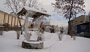 Snow and ice on a ancient water well. Erzurum, in Turkey