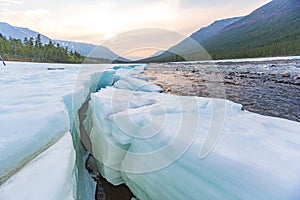 Snow and ice on the banks of the river Hoisey. Putorana Plateau, Taimyr