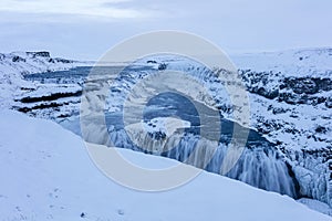 Snow and ice covered arctic landscape around Gulfoss Iceland