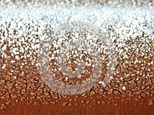 Snow ice texture. Thawed frost on a wooden board. wooden planks cowered with melting snow. Winter nature background of fluffy