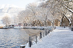 snow ice winter season trees road in Ioannina city Greece