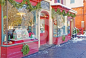 snow and icicles on Stockbridge Main Street scene with shops at Christmas