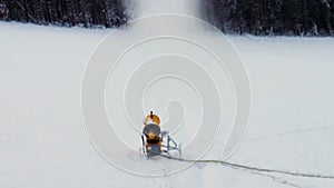 Snow machine gun on a ski slope