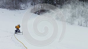 Snow machine gun on a ski slope