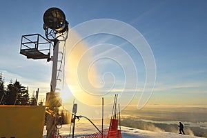 Snow Maker making snow at sunrise on Grouse Mountain