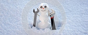 Snow man banner. Snowman in sunny winter cold day. Repairman with repair tools. Support repair and recover service.