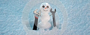 Snow man banner. Snowman in sunny winter cold day. Repairman with repair tools. Support repair and recover service.