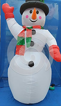 Snow man , with black cap red gloves displayed  to celebrate 25 December Jesus Christ birth day at Calcutta.