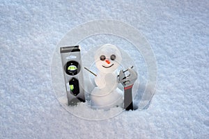 Snow man. Repairman with repair tools. Support repair and recover service. Snowman isolated on snow background.