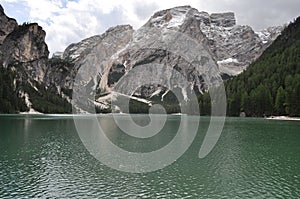 Snow montain lake photo