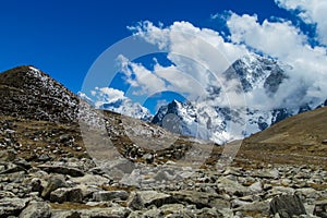 Snow mountain and cloudy valley view at Everest base camp trekking EBC in Nepal