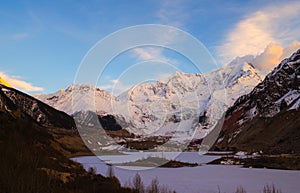 Snow mountain and glacier in the setting sun