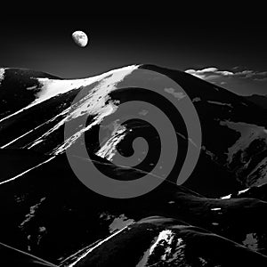 Snow mountain and moonlight