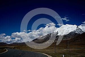 Snow mountain and road
