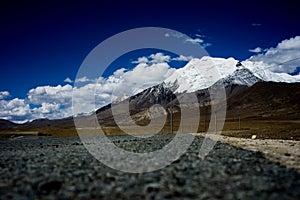 Snow mountain and road