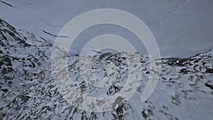 Snow mountain stone summit texture speed dynamic dive couloir gap winter