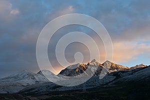 Snow mountain in sunrise sunshine