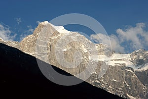 Snow mountain in sunset sunshine