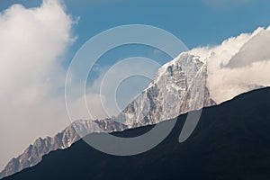 Snow mountain view with blue sky