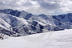 Snow and mountains at elevation photo