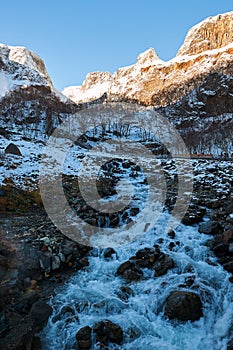 The snow mountains and river sunrise photo