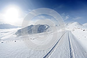 Snow mountains with road