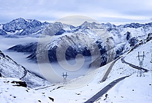 Snow mountains with road photo