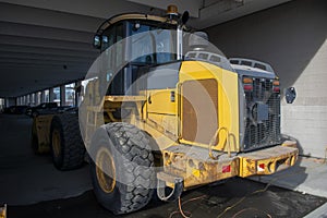 Snow Mover Wheel Loader Machine Parked in Parkade