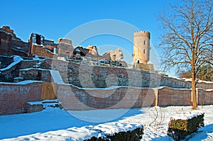 Snow over past ruins