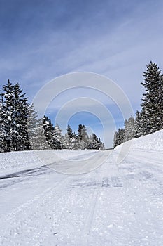 Snow packed road at Island park Idaho photo