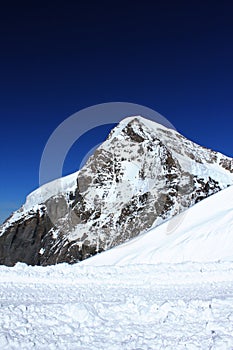 Snow peak with blue sky in Jungfraujoch