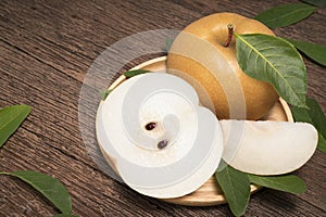 Snow pear or Korean pear on a wooden background, Nashi pear fruits delicious and sweet on wooden background