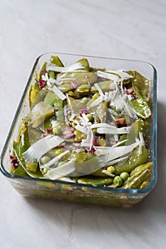 Snow Peas Salad with Parmesan Cheese and Red Onions