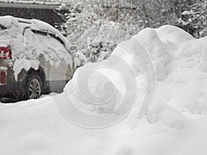 Snow Pile And Car